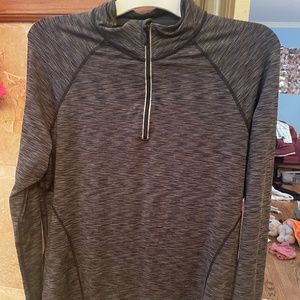 Woman's dark grey Ideology partial zip up workout top